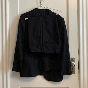 Express suit. Pinstripe and navy blue.